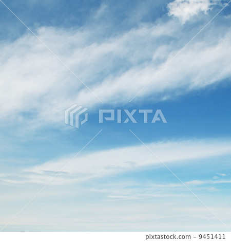 light clouds in the blue sky 9451411