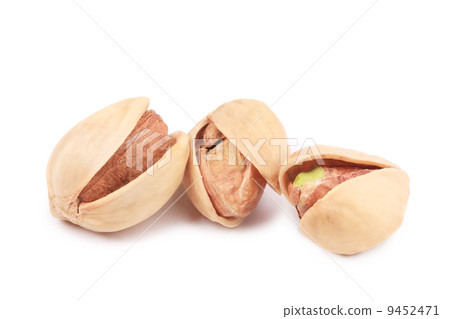 Three pistachios close up. Three pistachios close up. 9452471