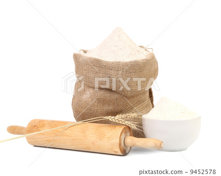 White flour and rolling pin. 9452578