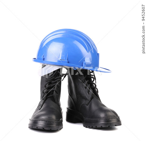 Hard hat and working boots. 9452607