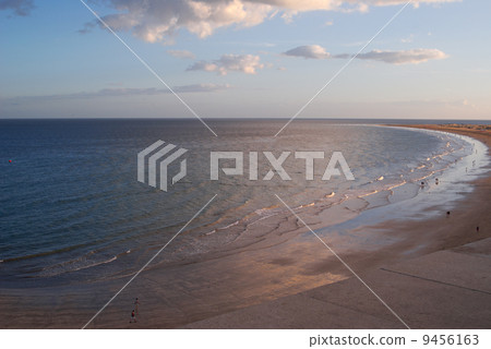 sea against the sunset sky 9456163