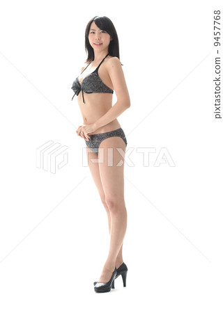 A good female model of style wearing a bikini 9457768