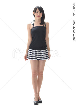 A woman in a mini skirt 9458058