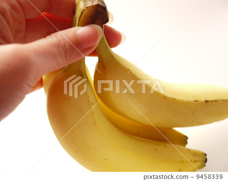 Hand with banana Hand with banana 9458339