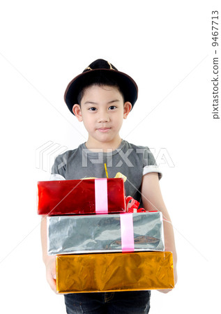 Cute little boy with gift box Cute little boy with gift box 9467713