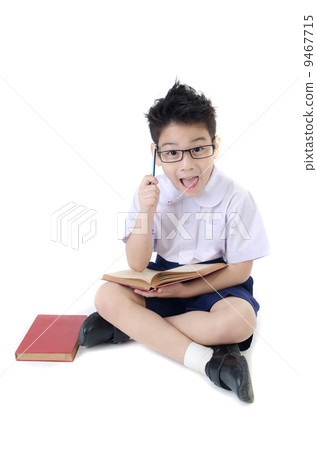 Asian child boy in student's uniform on isolated background Asian child boy in student's uniform on isolated background 9467715