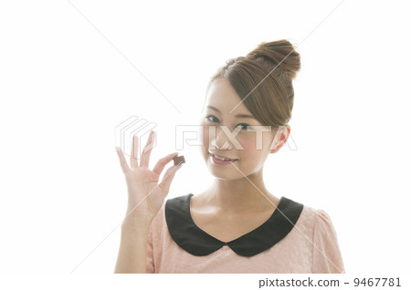 A young woman with chocolate 9467781