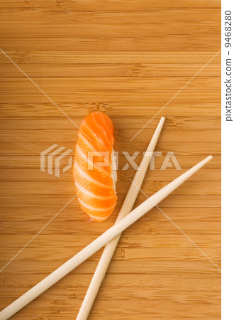 Sashimi with fresh salmon on bamboo plate Sashimi with fresh salmon on bamboo plate 9468280