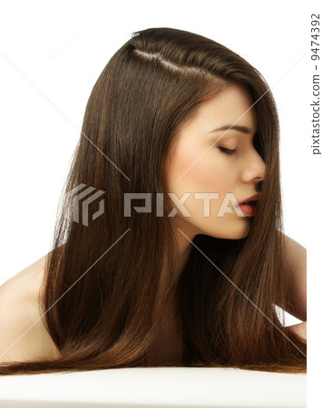 Beautiful young girl with long 9474392