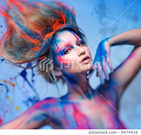 Young woman muse with creative body art and hairdo Young woman muse with creative body art and hairdo 9474416