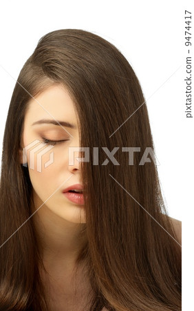 Beautiful young girl with long Beautiful young girl with long 9474417