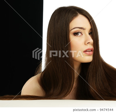 Beautiful young girl with long 9474544