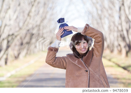 A woman giving a gift A woman giving a gift 9478039