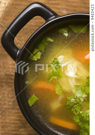 Chicken soup in the ceramic bowl 9483423