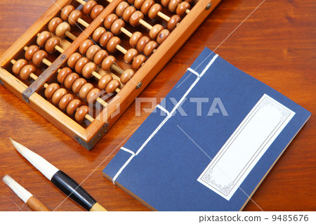 Chinese book , abacus and writing brush Chinese book , abacus and writing brush 9485676