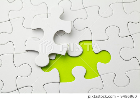 Puzzle with missing piece in green color Puzzle with missing piece in green color 9486960