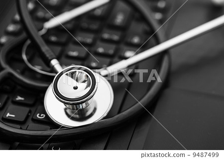 Stethoscope on keyboard 9487499