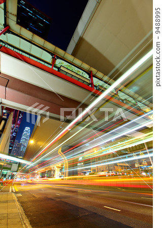 city in night with busy traffic city in night with busy traffic 9488995
