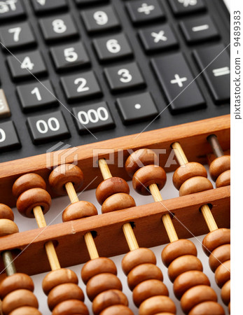 Ancient abacus and modern calculator Ancient abacus and modern calculator 9489383