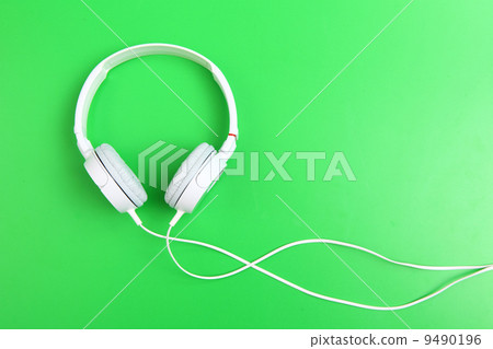 Headphone on green background Headphone on green background 9490196
