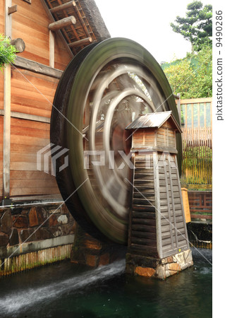 wooden waterwheel rotating. wooden waterwheel rotating. 9490286