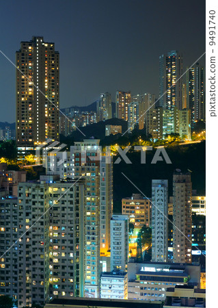 Hong Kong with crowded buildings at night 9491740