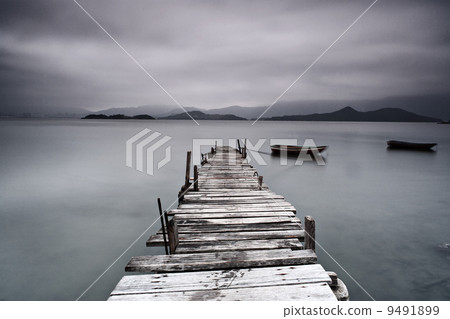 pier and boat, low saturation pier and boat, low saturation 9491899
