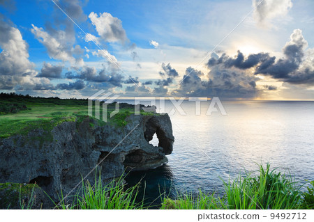 sunset on the rocks , in Okinawa , Manzamo sunset on the rocks , in Okinawa , Manzamo 9492712
