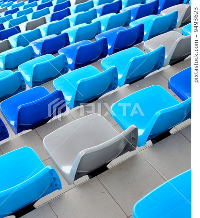 Blue seats at stadium 9493623