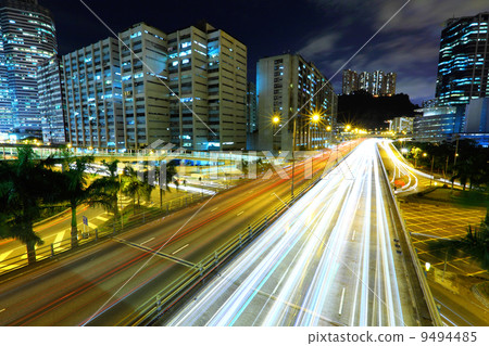 Highway at night in modern city 9494485
