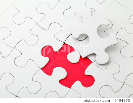 Puzzle with missing piece in red color Puzzle with missing piece in red color 9494570