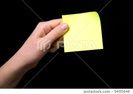 Holding a Sticky Note Holding a Sticky Note 9495646
