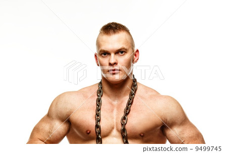Handsome young muscular man with chain 9499745