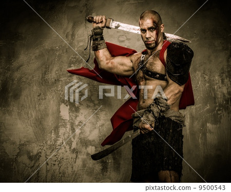Wounded gladiator with two swords covered in blood 9500543