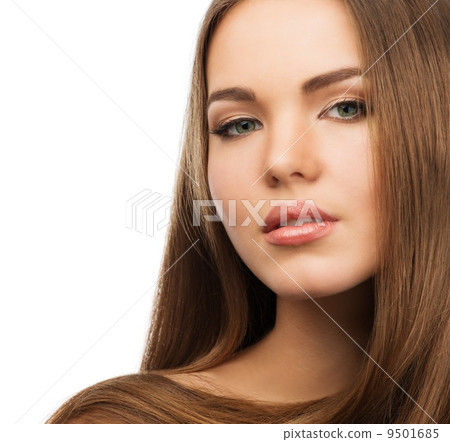 Beautiful young girl with long hair isolated on white Beautiful young girl with long hair isolated on white 9501685
