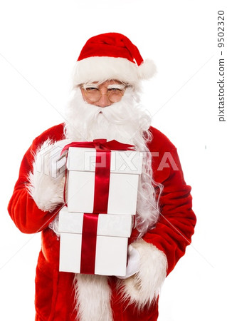 Santa Claus with gift boxes isolated on white background Santa Claus with gift boxes isolated on white background 9502320