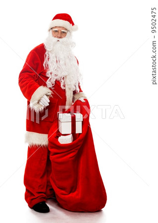 Santa Claus with christmas sack and gift boxes isolated on white background Santa Claus with christmas sack and gift boxes isolated on white background 9502475
