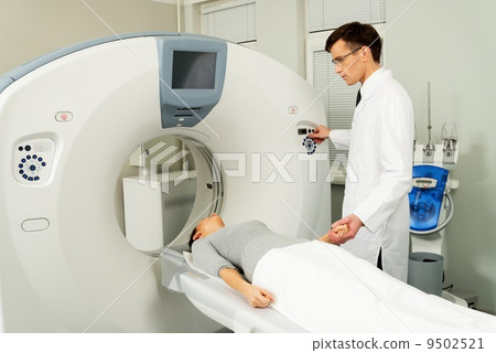 Young woman visiting computed tomography lab 9502521