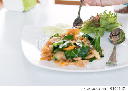 eating fried noodle eating fried noodle 9504147