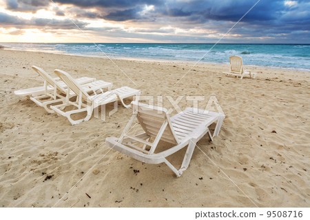 deckchairs on beach 9508716
