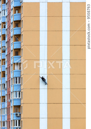 steeplejacks on a concrete wall steeplejacks on a concrete wall 9508763