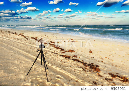 old camera on beach old camera on beach 9508931