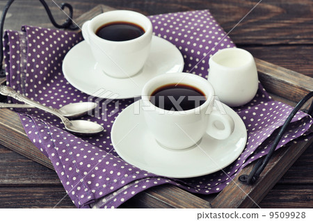 Coffee in cups 9509928