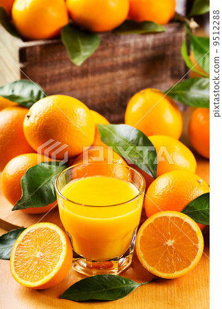 glass of orange juice with fresh fruits glass of orange juice with fresh fruits 9512288