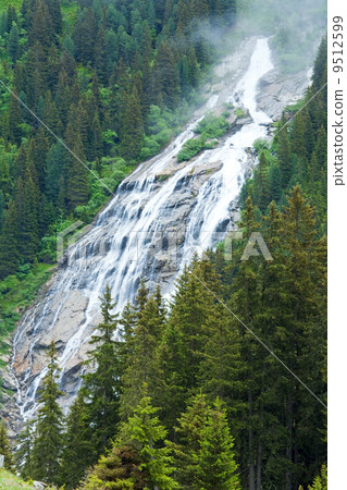 Alps waterfall summer view 9512599