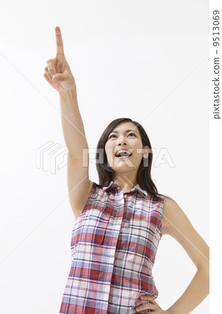 A woman pointing her finger 9513069