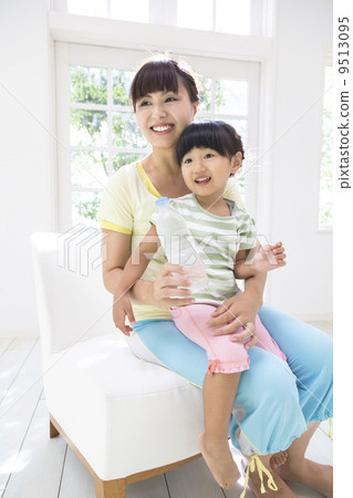 Parents sitting on the sofa 9513095