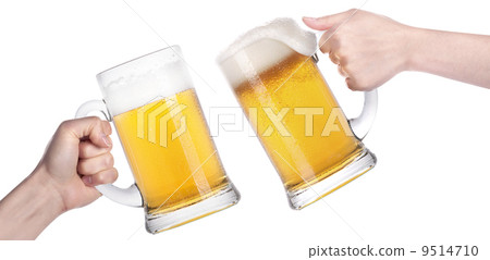 Frosty glass of beer with hand.making toast Frosty glass of beer with hand.making toast 9514710
