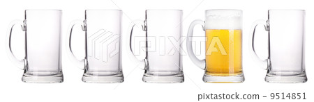 empty and one full beer glass isolated 9514851