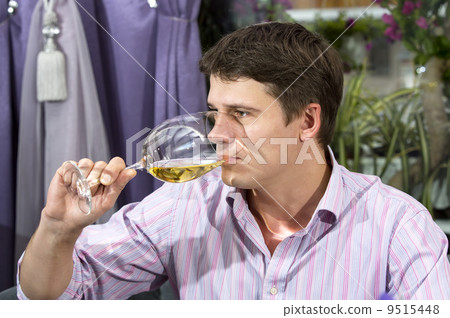 one young man having dinner in a restaurant 9515448